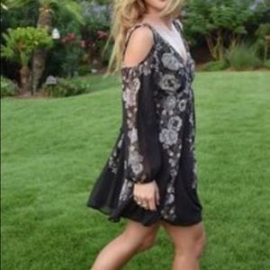 WORN ONCE. VERY RARE Free People dress. Grey with floral pattern and unique back